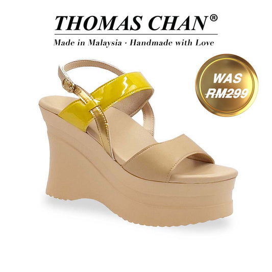 Diagonal view of Thomas Chan’s Colorplay Slingback Wedges with a 4-inch beige platform wedge sole, featuring matte nude front straps, a glossy yellow patent slingback strap, and a cushioned footbed. "THOMAS CHAN®" brand displayed with "Made in Malaysia · Handmade with Love" below. Gold and white banner highlights special offer: "Was RM299"