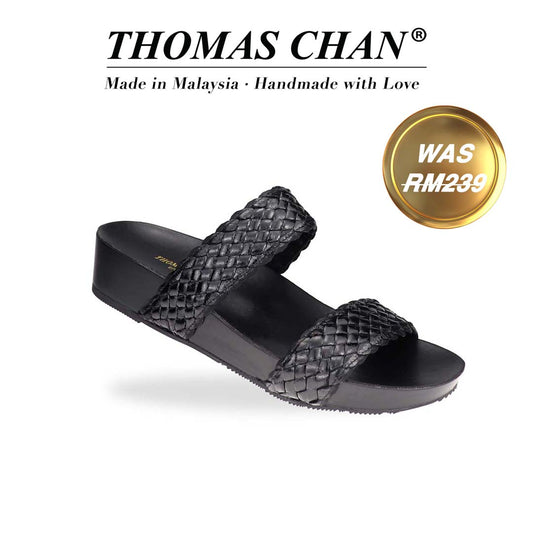 Black twin band flatform sandals in diagonal view on white studio background – Thomas Chan LiteStep Collection. The 'THOMAS CHAN®' brand logo is prominently displayed, with the inscription 'Made in Malaysia · Handmade with Love' beneath it. A gold and white banner highlights the special offer: 'Was RM239.'