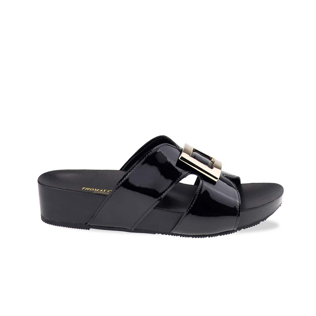 Side profile of Thomas Chan LiteStep flatform sandals in black patent leather, featuring square gold buckle, on white studio backdrop.