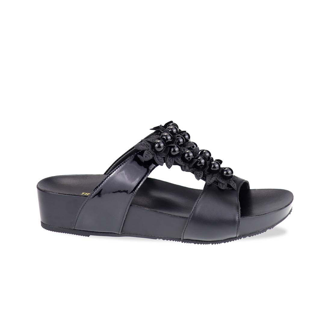 Side view of Thomas Chan Petal Pearl Flatform Sandals showcasing sleek silhouette, black straps, and arch-friendly LiteStep footbed.