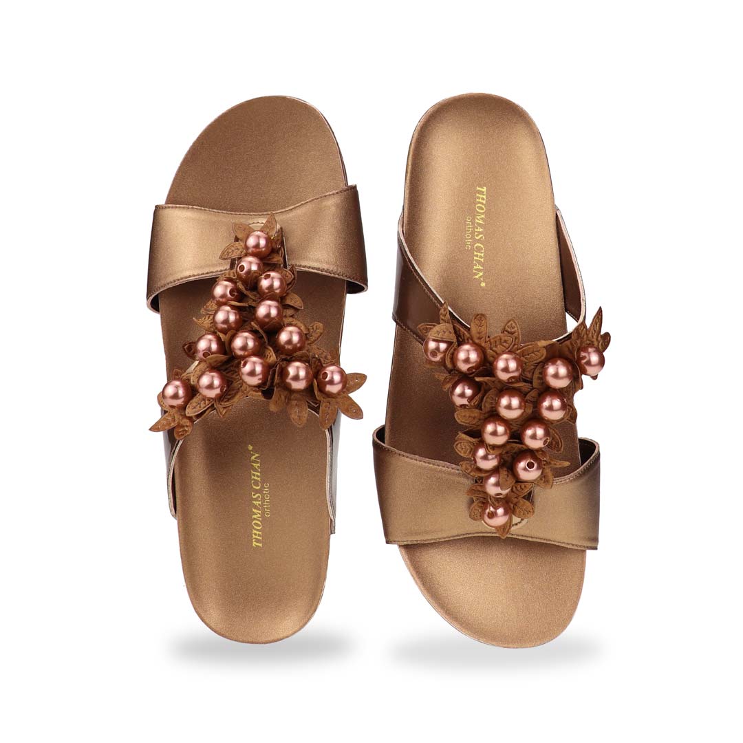 Front view of Thomas Chan Petal Pearl Flatform Sandals with centered pearl flower design on bronze strap, perfect for elegant comfort.