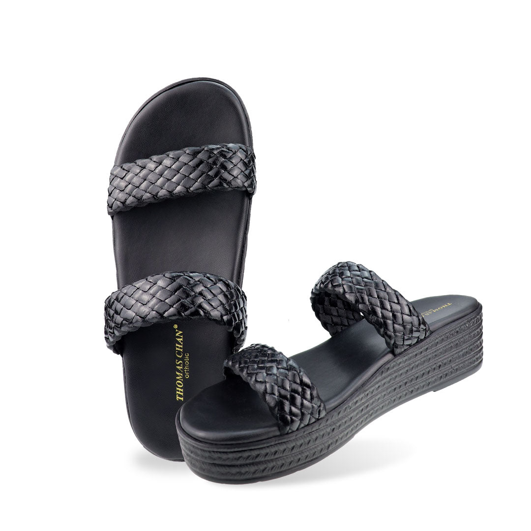 Full view of Thomas Chan Braided Strap Flatform Sandals in black, featuring a comfort cushioned footbed. The platform, with a black braided element, measures 3cm at the front and 5cm at the back.