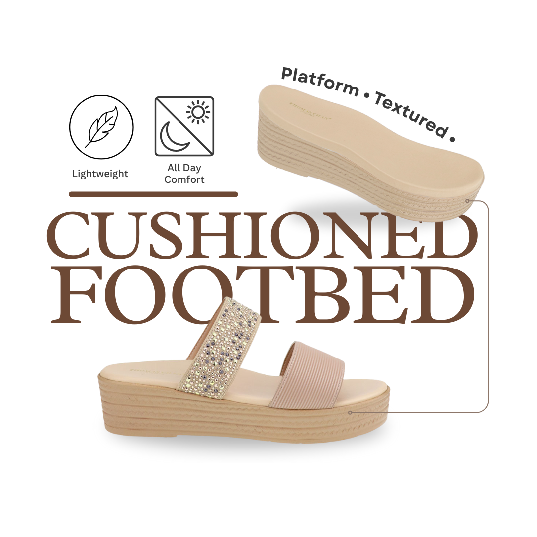 Platform sandals with cushioned footbed and refined textured details, designed for heightened all-day comfort