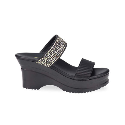 Side view of Thomas Chan's Strappy Rhinestone Cushioned Heels in black: With a built-in cushioned footbed and a chic two-strap design, these heels offer a sleek front stripe complemented by a dazzling rhinestone strap at the back.