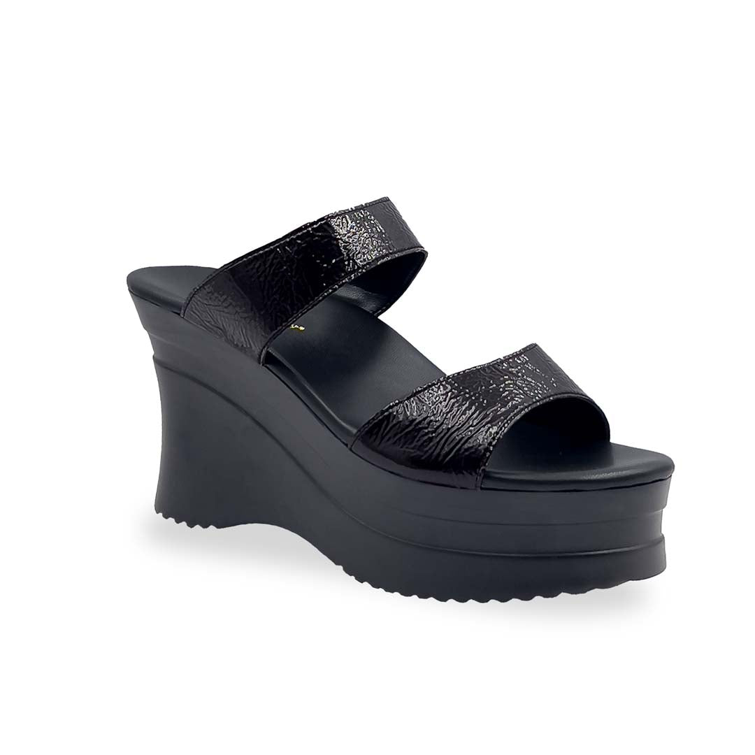 Thomas Chan's Minimalist Slip-on Heels in wrinkled patent black with a 4-inch platform black wedge sole, featuring two wide textured patent-finish straps and a cushioned footbed for added comfort.