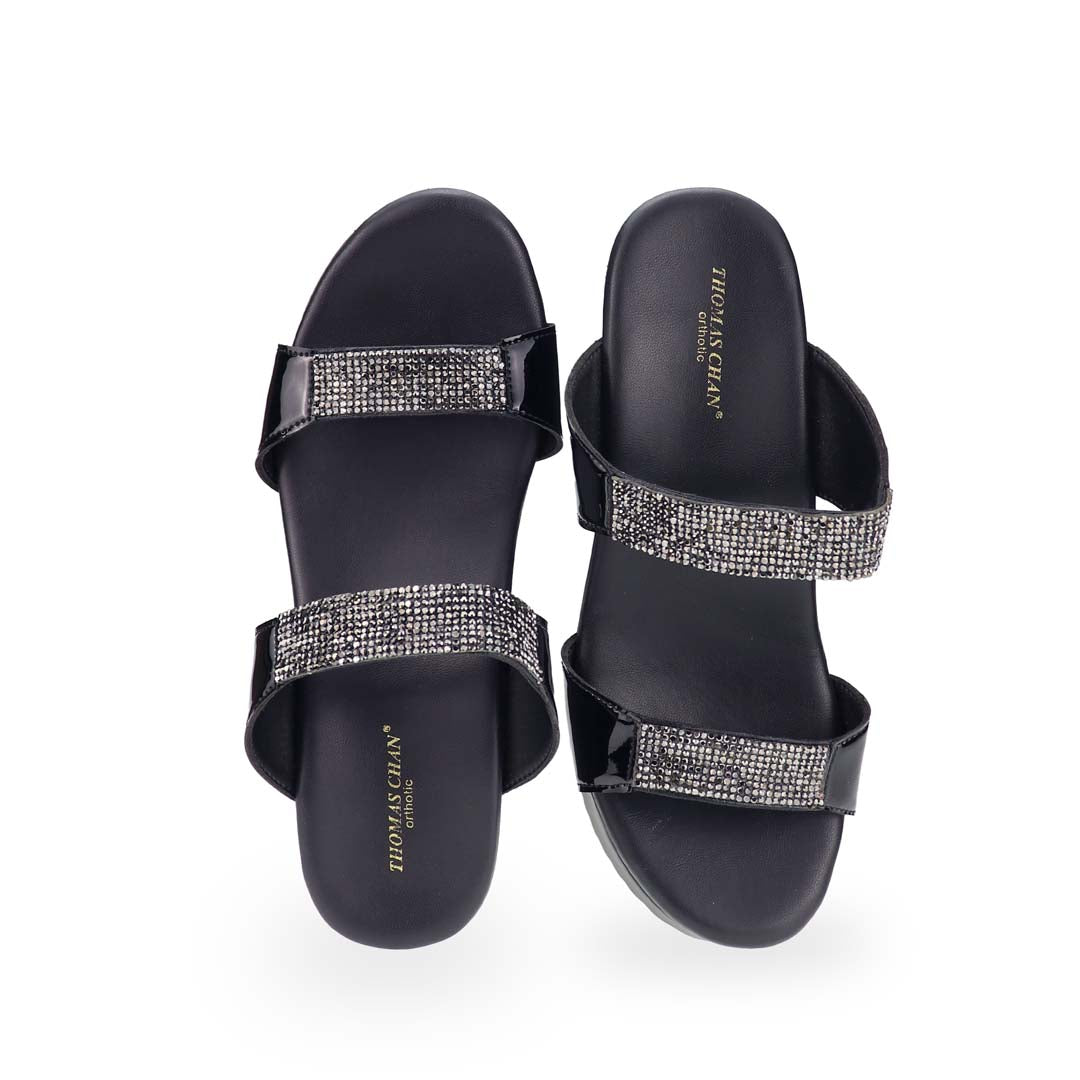 A close-up front view of the heels, focusing on the intricate arrangement of multi-row diamond straps that add a glamorous touch to the design.