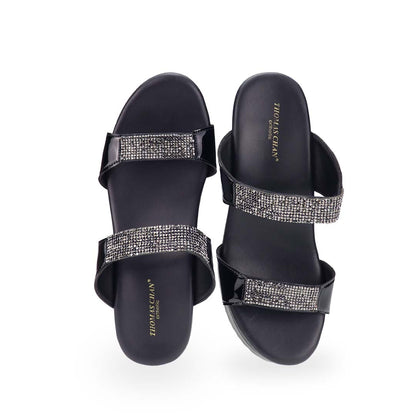 A close-up front view of the heels, focusing on the intricate arrangement of multi-row diamond straps that add a glamorous touch to the design.