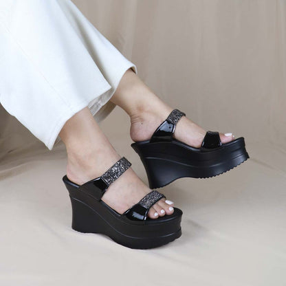 A model elegantly wearing Thomas Chan’s Multi-Row Diamond Heels, demonstrating how they elevate any outfit with their sophisticated sparkle and comfortable fit.