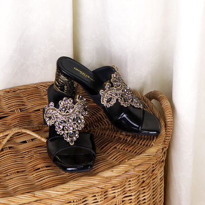 Thomas Chan's Black Glamour Vintage Rhinestone Block Heels: Embrace classic elegance with a touch of sparkle. Perfect for dinners and special events, these vintage-inspired heels adorned with rhinestones exude timeless allure.