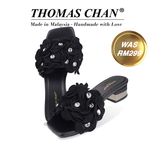 Full studio view of the Blooming Flower Evening Heels, capturing the entire silhouette, from square toe to back heel, with floral crystal accents. The "THOMAS CHAN®" brand is displayed with "Made in Malaysia · Handmade with Love" below. A gold and white banner highlights a special offer: "Was RM299."