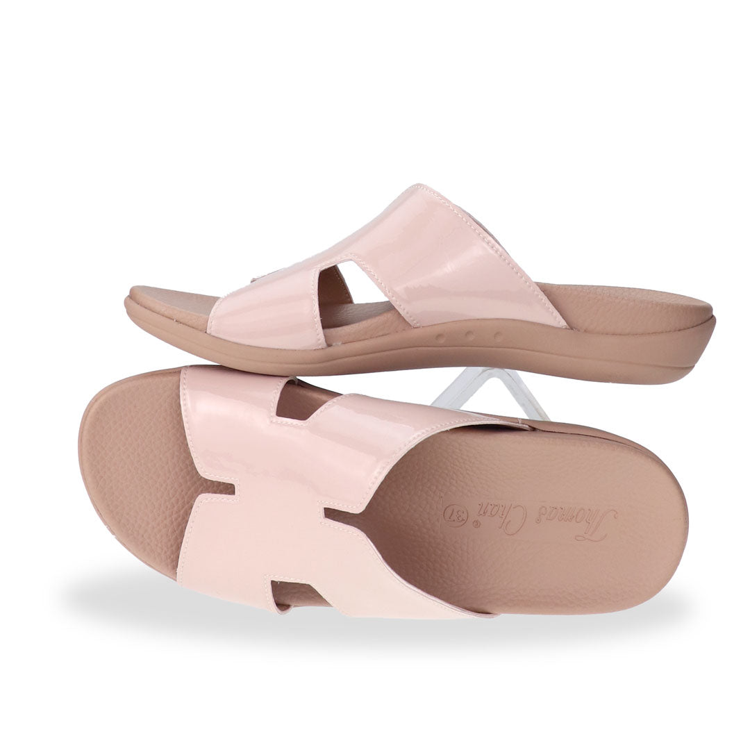 A full shot of Thomas Chan’s Extra Comfort H-Strap Flats in Nude Pink, highlighting the elegant structure, breathable microfibre leather, and cushioned arch-support footbed.