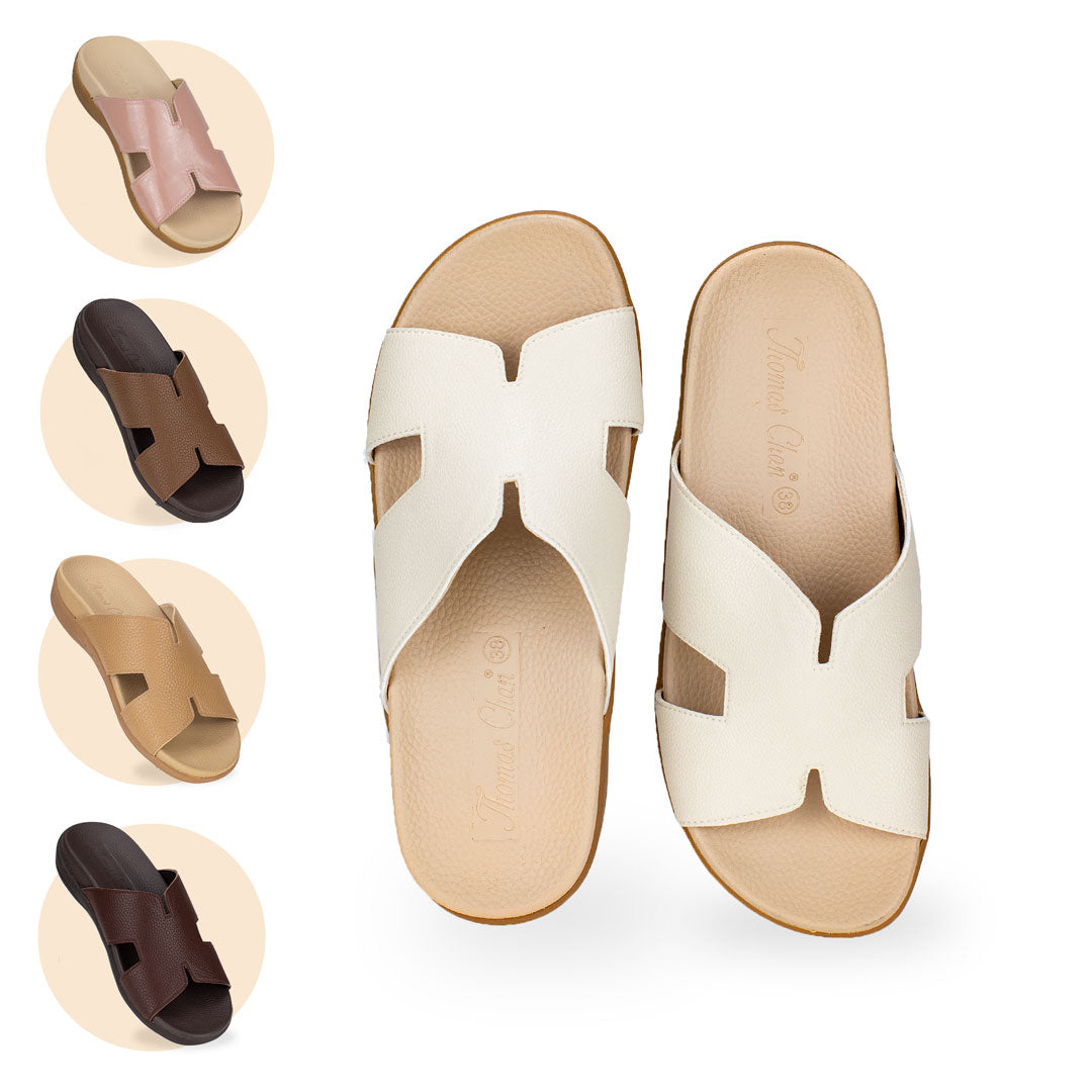 Thomas Chan H-strap flat sandals with in-built insoles providing great arch support, available in ivory, pink, light brown, camel, and dark brown colors.