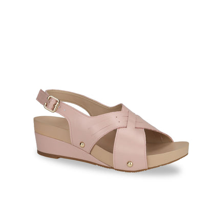 Diagonal view of Thomas Chan Cross Strap Slingback Low Wedge Sandals in pink, featuring built-in arch-support insoles for enhanced comfort and ease of walking