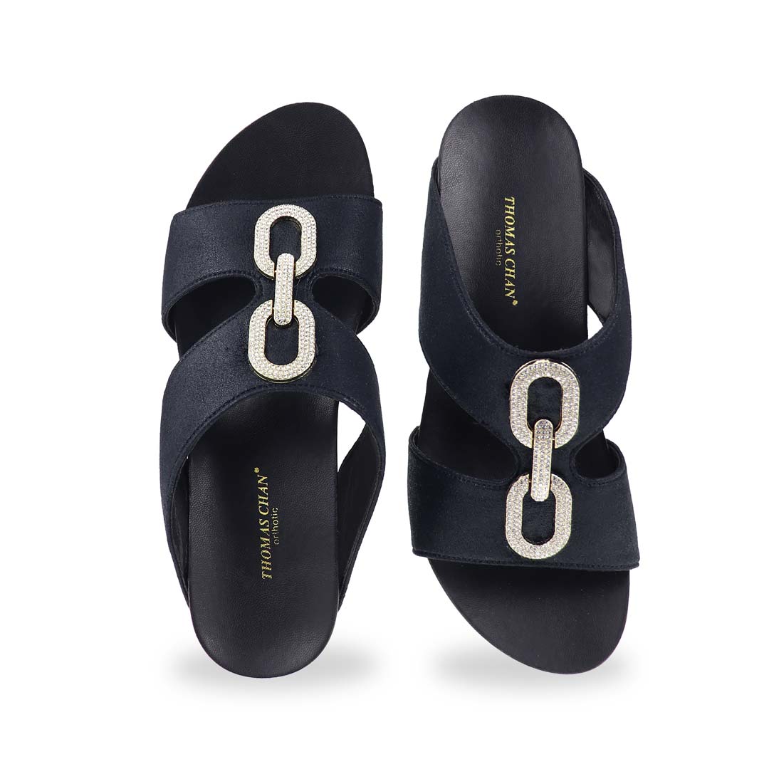 Front view of Aurora Chain High Wedges showing sparkling buckle details and open-toe design with luxe shimmer.