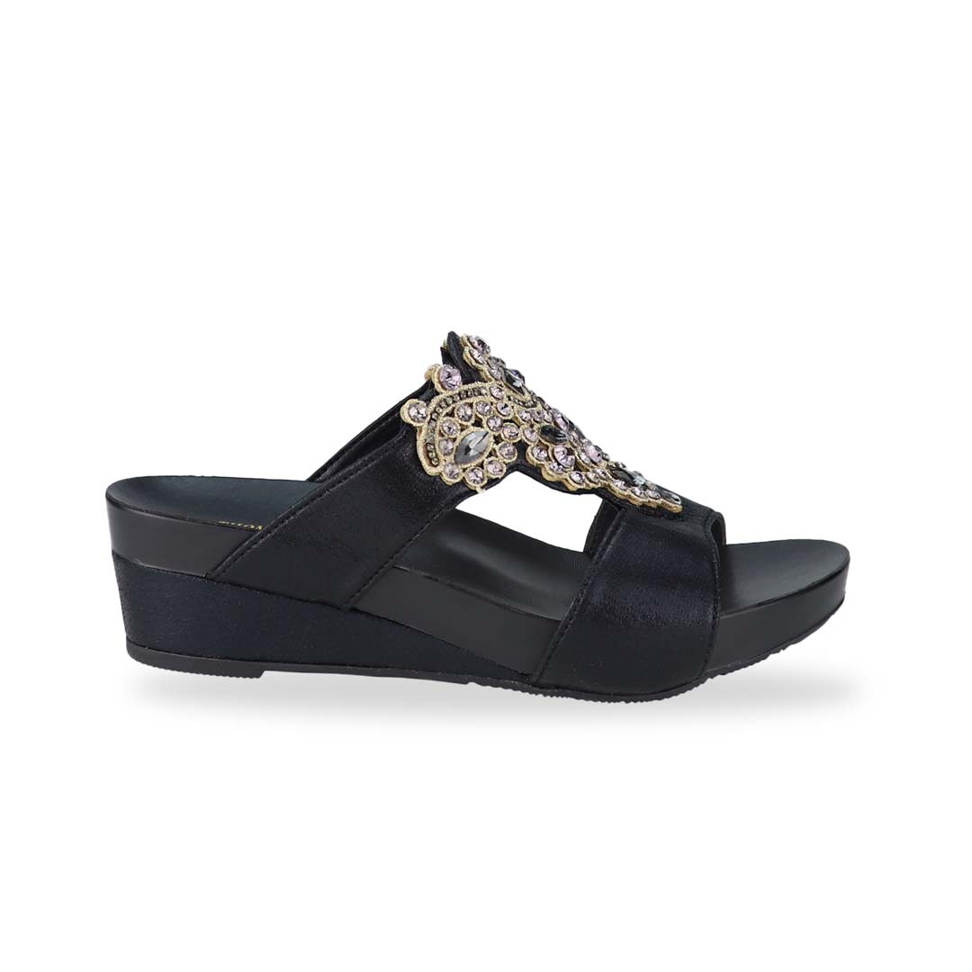 Side view of Thomas Chan's Vintage Rhinestone Low Wedge Sandals in black, adorned with vintage-inspired rhinestone detailing ,and an arch-support footbed.