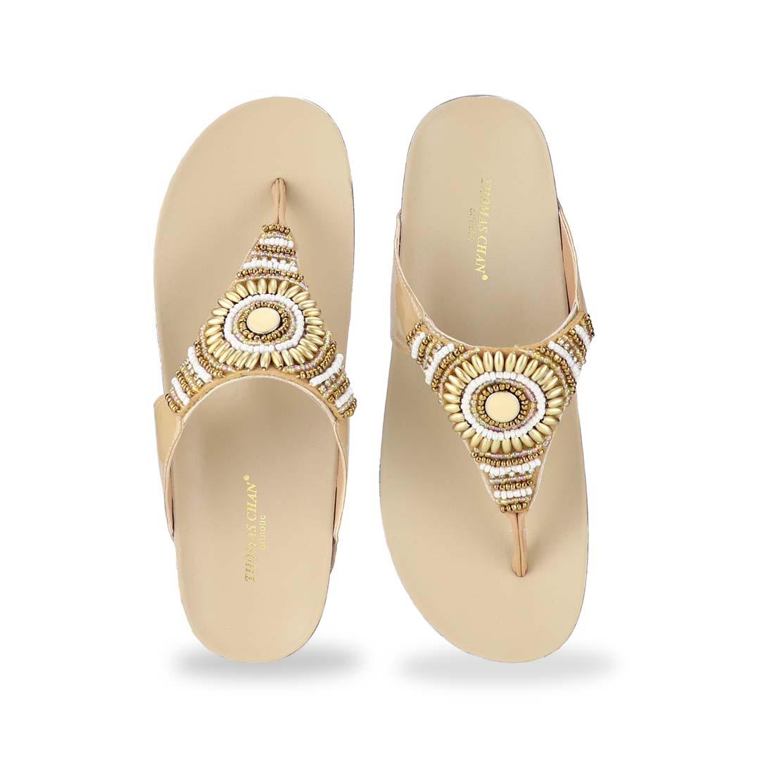 Front view of Thomas Chan's Boho Beaded Flatform Flip-Flops in cream, showcasing the boho beaded design and LiteStep flatform footbed. The image highlights the flip-flops' boho beaded accents and casual style.