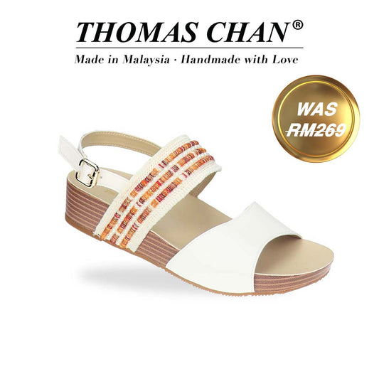 Diagonal view of Thomas Chan’s Summer Love Duo-Strap Slingback Sandals in ivory, showcasing elegant duo straps, a secure slingback design, and a LiteStep flatform sole with light arch support, emphasising their casual yet sophisticated style.The 'THOMAS CHAN®' brand logo is clearly visible, with the inscription 'Made in Malaysia · Handmade with Love' underneath. A gold and white banner showcases the special offer: 'Was RM269.'