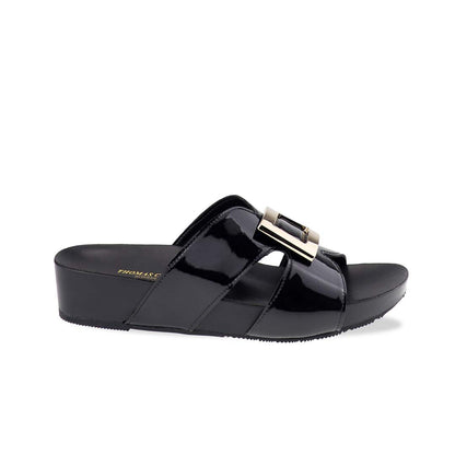 Side profile of Thomas Chan LiteStep flatform sandals in black patent leather, featuring square gold buckle, on white studio backdrop.