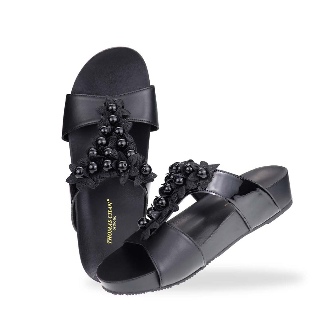 Full view of Thomas Chan Petal Pearl Flatform Sandals—showing symmetrical flower pearl accents and lightweight flatform sole in black.