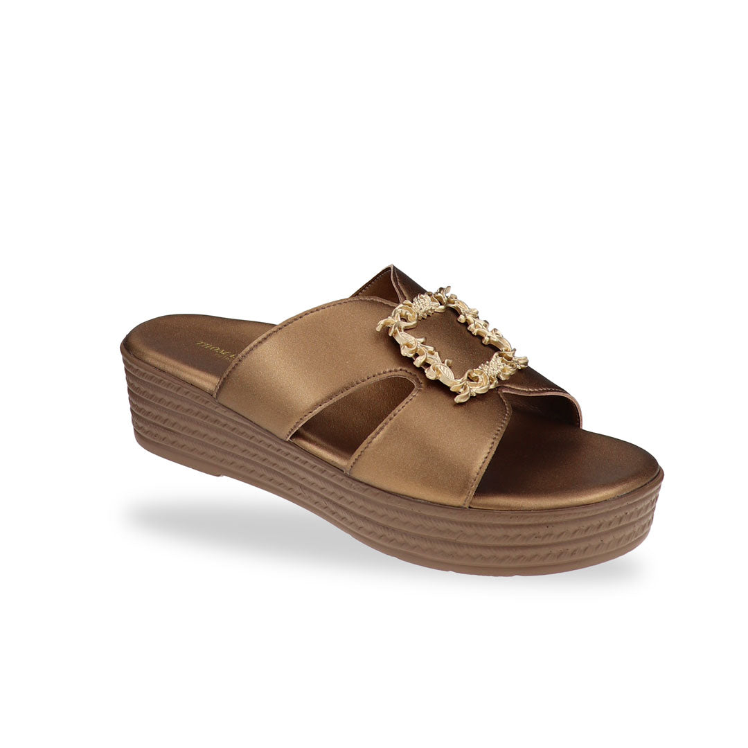 Thomas Chan bronze colour  Vintage Framed Flatform Sandals in a diagonal studio view, highlighting the textured flatform sole, sleek bronze finish, and gold embellished buckle at an angle.