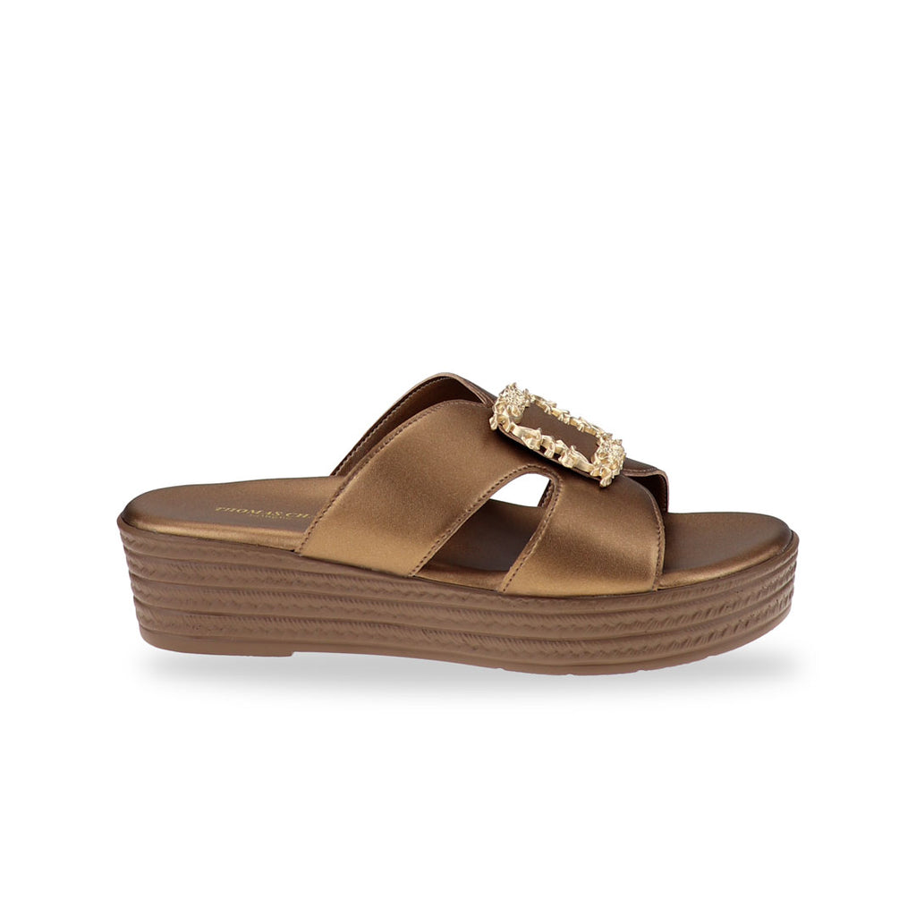 Side profile of the Thomas Chan Vintage Framed Flatform Sandals in bronze, showcasing the layered bronze flatform sole and soft cushioned upper with a detailed gold frame buckle.