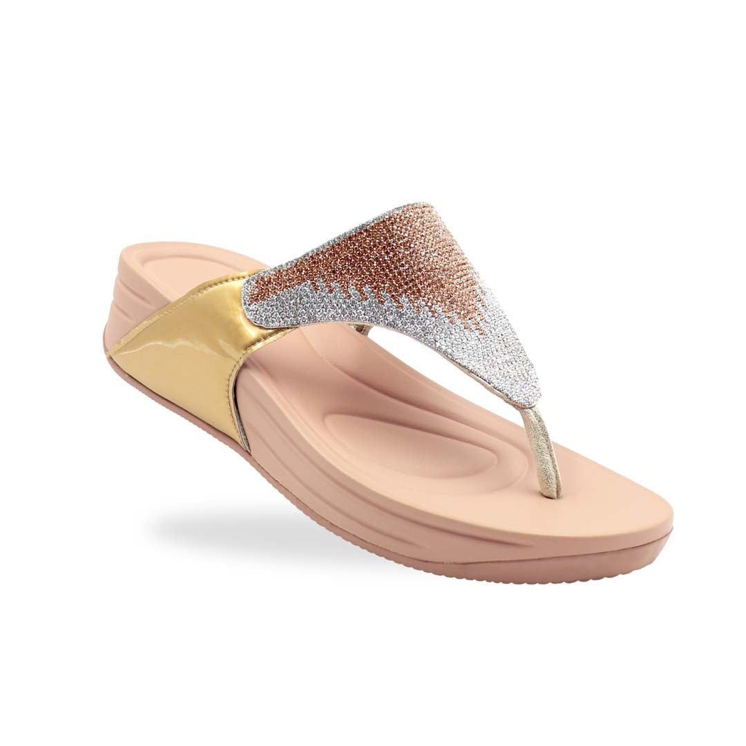 A close-up diagonal shot of the Diamond Embellished Flip-Flop Sandals in Gold from the Bounce Care Series, placed on a clean studio background. The shimmering crystal-embellished straps catch the light, while the cushioned flatform sole is visible from the side, highlighting its gentle elevation and soft rubber texture.