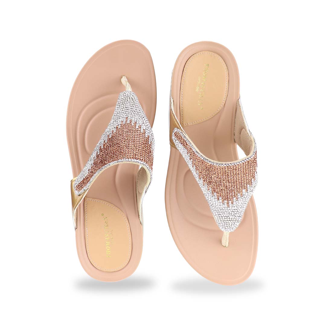 A front-facing image of the Diamond Embellished Flip-Flop Sandals in gold, highlighting the sparkling crystal-studded straps and the soft toe-post design. The cushioned footbed is slightly contoured for support, blending style with comfort.