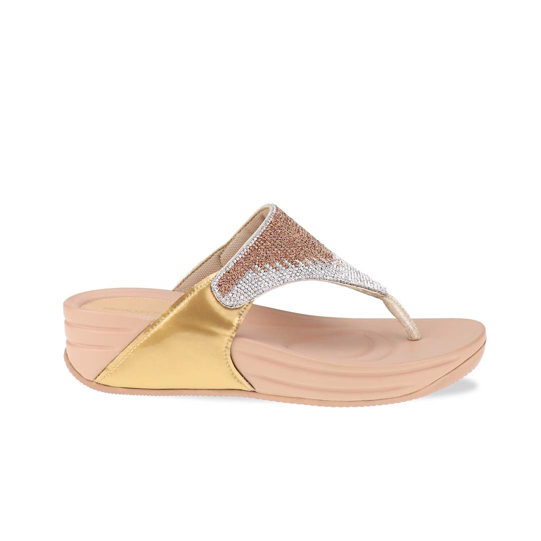 A side-angle view of the Diamond Embellished Flip-Flop Sandals in gold, showcasing the subtle height of the flatform sole and the glossy finish of the side panels. The rubber sole's soft curves and cushioned footbed are visible, emphasising comfort and support.