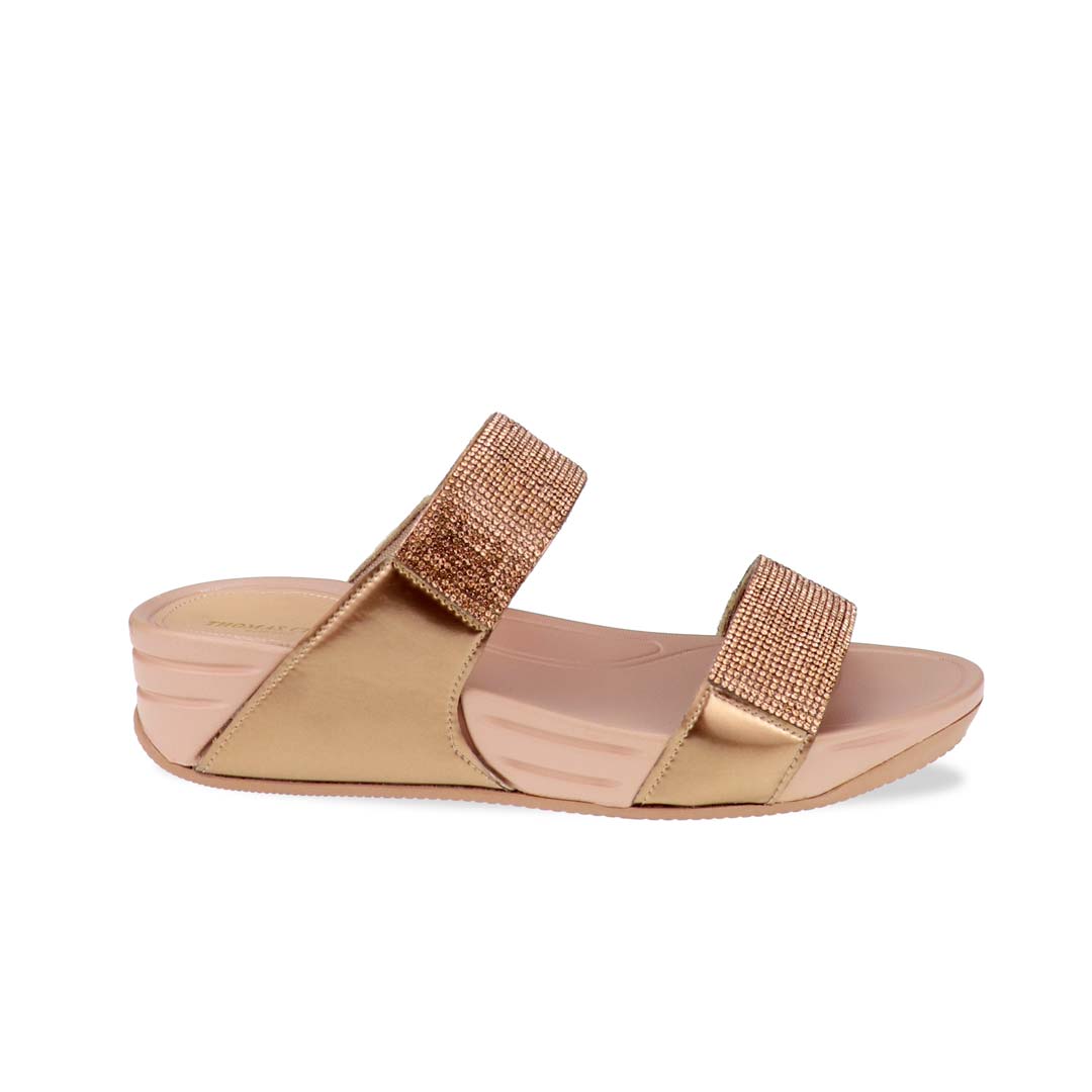 A side view of the Diamond Embellished Duo-Strap Bounce Care Sandals in Bronze, showcasing the soft rubber sole’s slight elevation and ergonomic design. The straps’ dazzling embellishments add a luxurious touch, perfect for both casual and dressy looks.