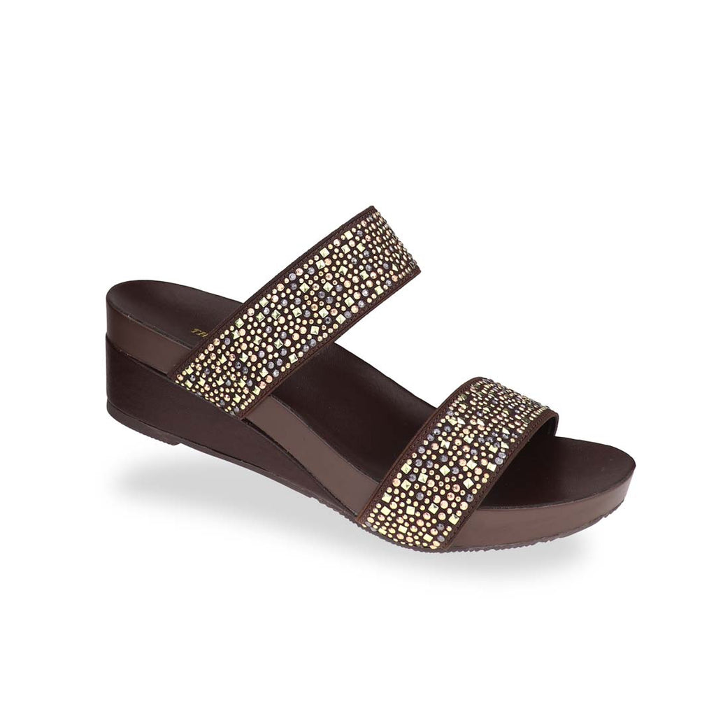 Diagonal view of Thomas Chan's Blinkies Twin Band Wedges – sparkling twin-strap low wedges in brown with arch-support footbed for women.